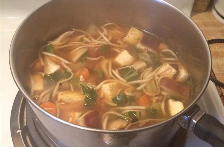 Tofu Udon Noodle Soup With Mushrooms and Vegetables